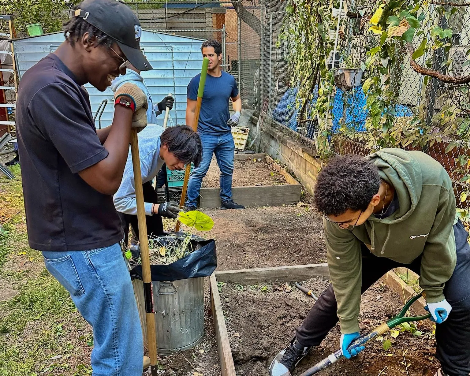 EWB-CCNY students working together on a community garden bed